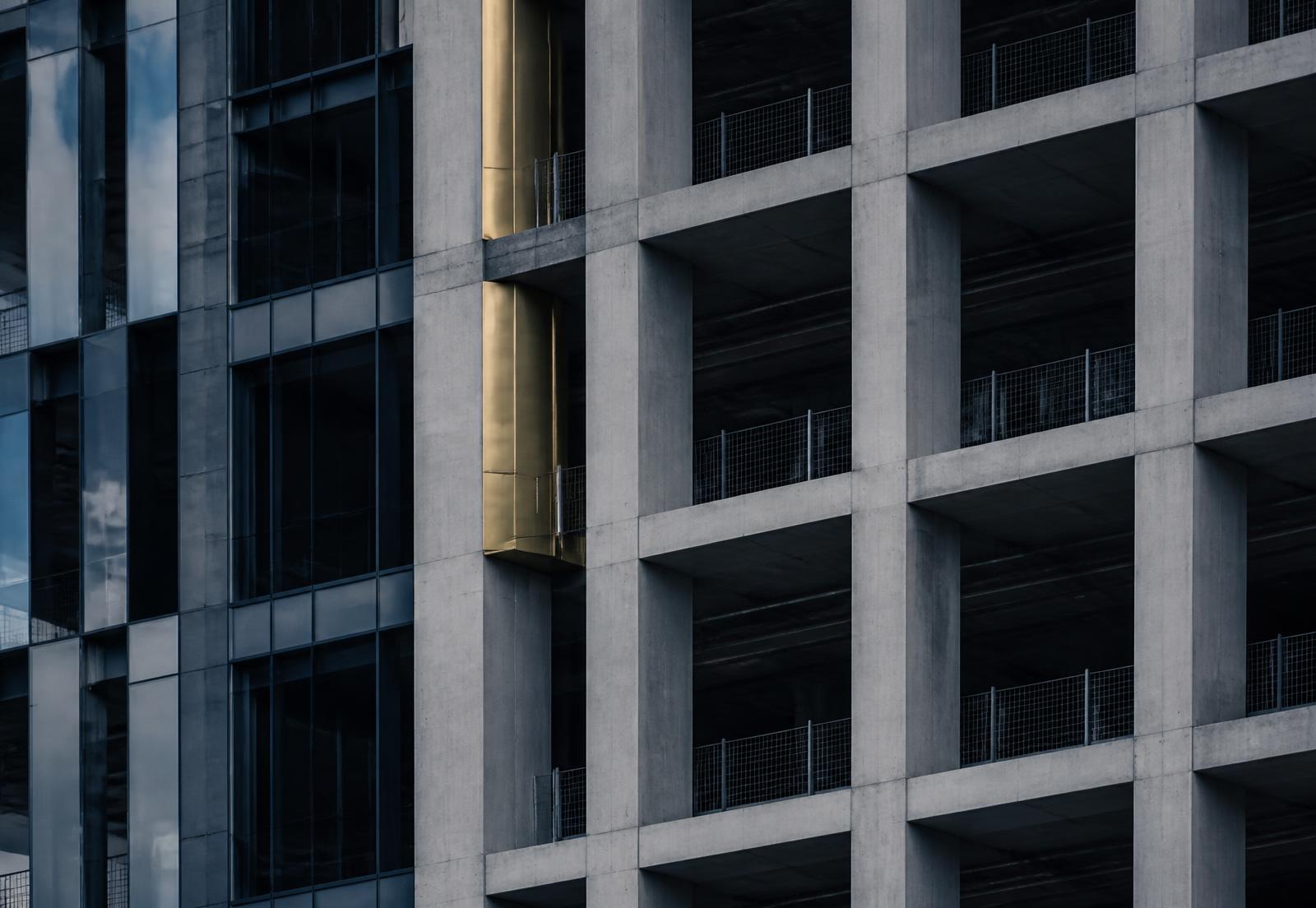 Concrete and steel facade grid of a high-rise under construction